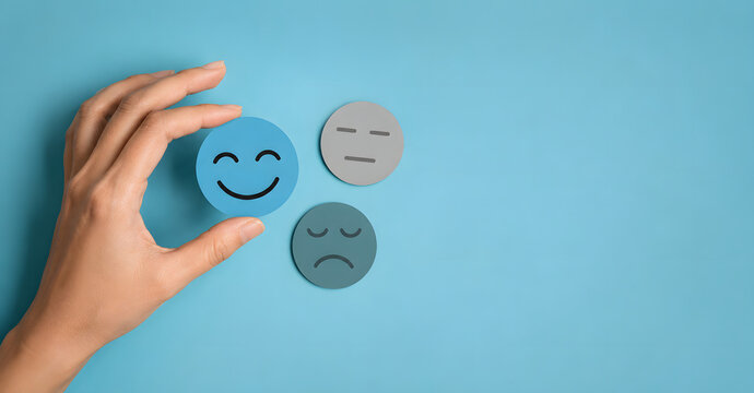 Hand Holding Blue Smile Face for Mental Health Awareness
