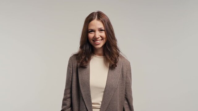 Sarcastic Businesswoman Making Air Quotes. Female CEO Rolling Her Eyes in Disbelief During an Office Conversation at Work.