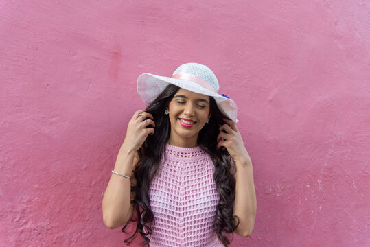 Portrait of a Woman with a Hat and Pink Dress
