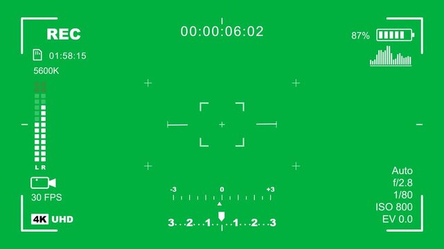 Camera viewfinder recording overlay with blinking rec icon, running timecode, focus box and exposure meter on green screen in 4K