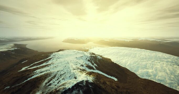 melting glacier edge under sunrise glow, visible runoff and thaw channels, poignant environmental view with urgency and fragile coastline detail