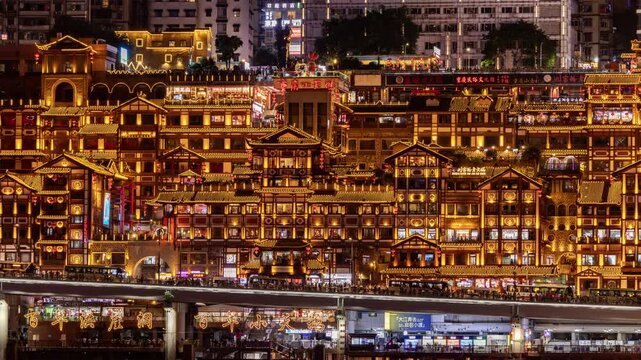 Chongqing cyberpunk city skyline with river and hongyadong night time