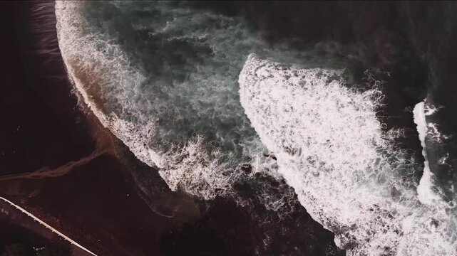 Drone shot, from above, surf at the beach of Praia dos Mosteiros, Mosteiros, Sao Miguel Island, Azores, Atlantic Ocean, Portugal