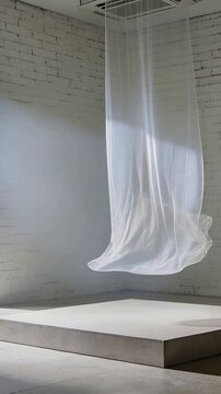 Vertical video: Billowing white sheer fabric panel rising from ceiling vent airflow in studio