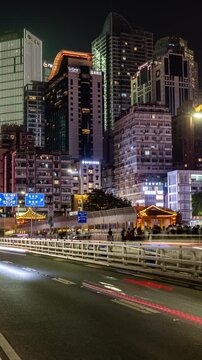 Chongqing cyberpunk city skyline on the Qiansimen Bridge in vertical