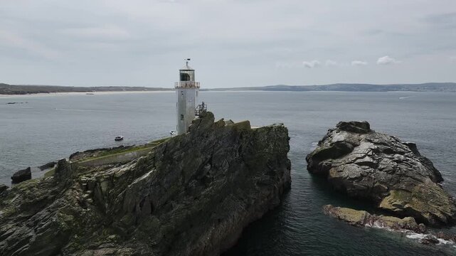 Godrevy Lighthouse from a drone, Godrevy Island, St Ives Bay, Cornwall, England, United Kingdom