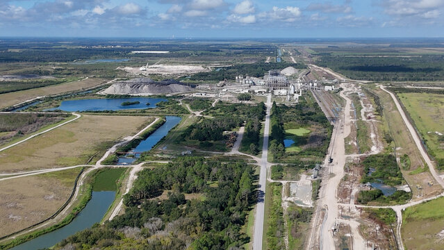 Aerial view of the Phosphor 4 Corners Mine featuring industrial processing facilities, tailings ponds, and surrounding wetlands in Duette, Florida, United States.
