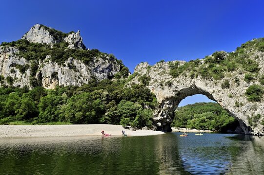 Canoes on the Ard&egrave;che river, above the Pont d'Arc rock gate, Ard&egrave;che Gorge, Gorges de l'Ard&egrave;che, Vallon-Pont-d'Arc, Rh&ocirc;ne-Alpes, France