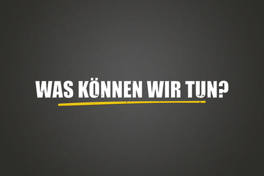 Was koennen wir tun (What can we do?) - A blackboard with white text.