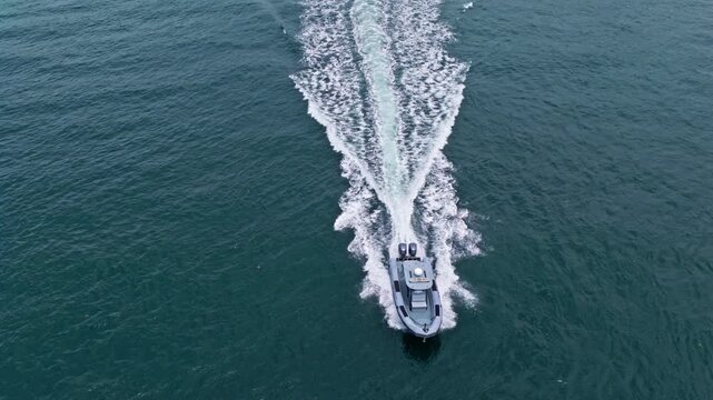 Miami, Florida, USA - May 22, 2025: Vacation on summer. Sea summer vacation. Sea motorboat. Yacht sailing at sea. Motorboat aerial top view. Luxury boat motor yacht. Luxury yacht in sea aerial view
