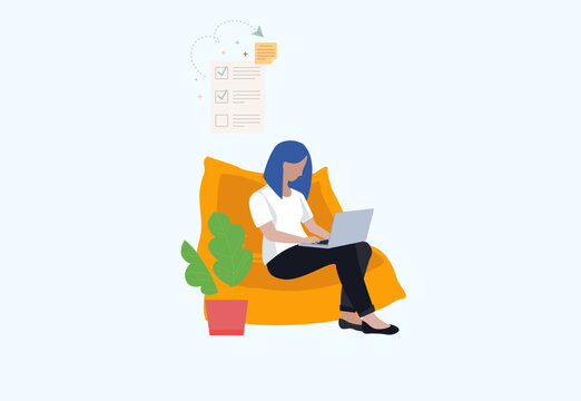 A person is sitting in a large orange beanbag chair, working on a laptop. The atmosphere conveys a sense of productivity, remote work, or studying in a relaxed setting.