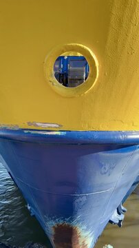 Yellow and Blue Helsinki Ferry Bow With a Porthole