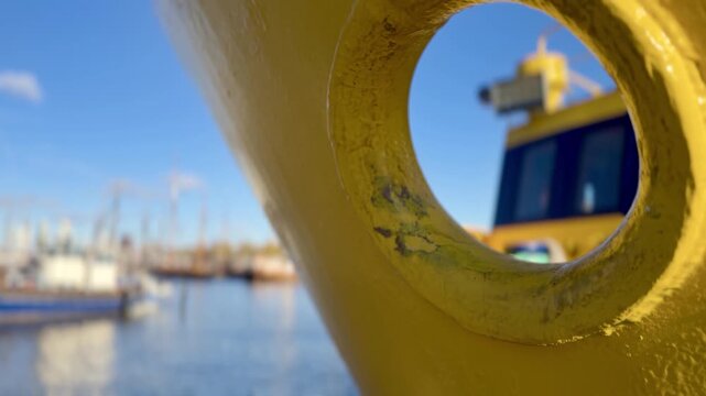Helsinki Harbour View Framed Through a Yellow Mooring Ring