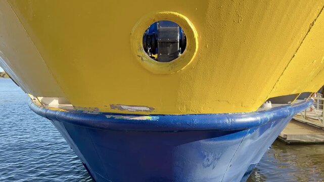 Close View of a Painted Ferry Hull Above the Waterline