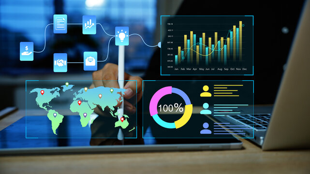 Business data analytics dashboard on laptop, Business professional uses a laptop with virtual data dashboards, global map, charts, and connected app icons in a modern office.