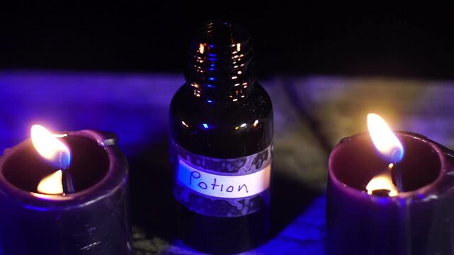 a potion bottle with candles