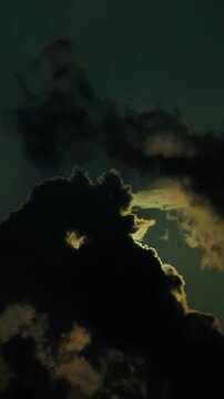 Sun Hidden Behind Dark Storm Clouds with Silver Lining effect