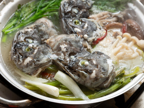 Korean spicy fish stew known as Ureok-maeuntang with raw rockfish chunks and assorted mushrooms