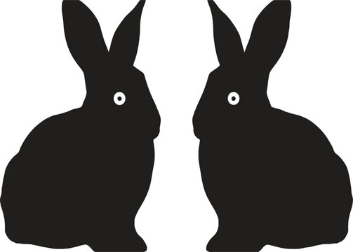 Two black rabbit silhouettes facing each other on a white background isolated vector graphic bunny animal
