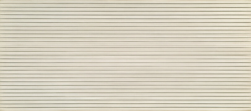 Horizontal beige siding texture with parallel lines and shadows