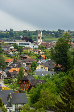 Worb village landscape with church clock tower in the Swiss countryside