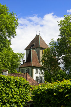 Schloss Jegenstorf castle surrounded by trees in Switzerland