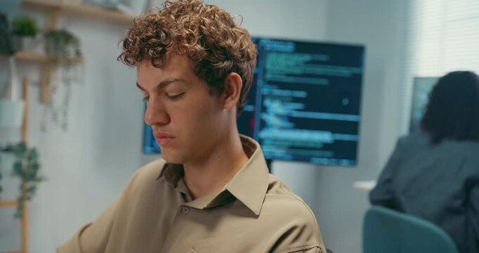 Group Adult male, female freelance typing write prompt AI bot IT app smart program nomad, video game, terminal with coding language, user interface, designer, big data center on desktop computer.
