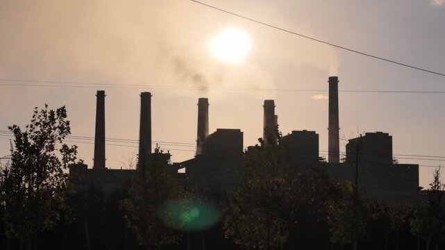 pristina thermal power plant silhouette at sunset in kosovo