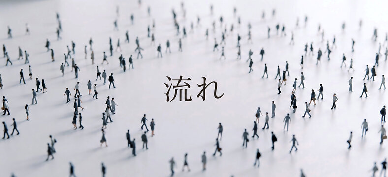 Miniature people figures walking in organized crowds on white surface with Japanese text symbol for flow concept