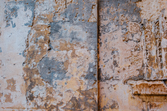 Weathered Limestone Wall Texture with Peeling Paint and Carved Ledge