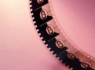 Obraz premium Arching Movie Film Strip with Repeated Countdown Number 8