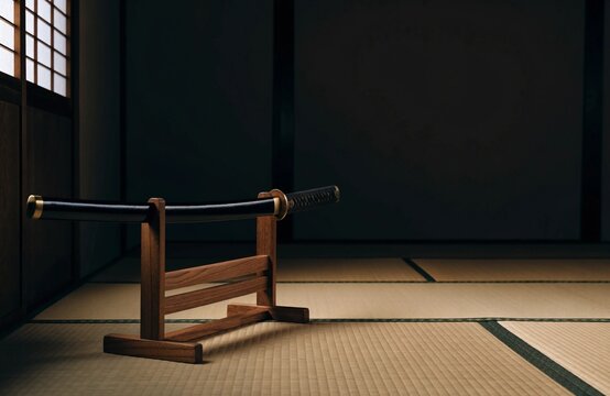 Japanese katana in a black scabbard on a wooden sword stand in a dark tatami room