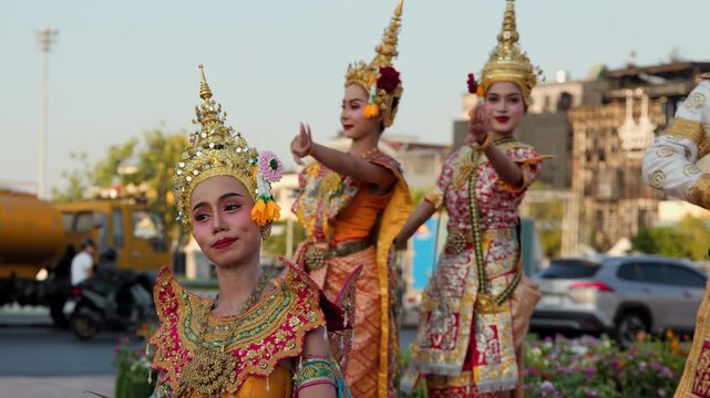 Thai Traditional Dancers Performing in Elaborate Costumes Outdoors