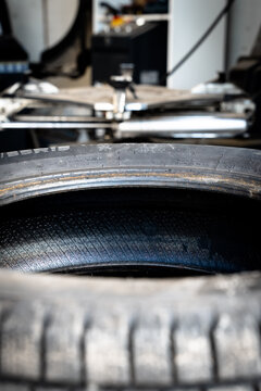 VALMIERA, LATVIA &ndash; OCTOBER 17, 2026: Car Tires at a Tire Changing Machine in an Automotive Workshop