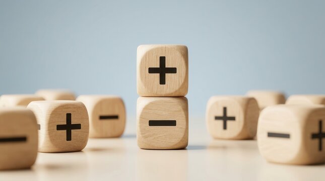 Wooden blocks with plus and minus symbols for business profit and loss analysis.
