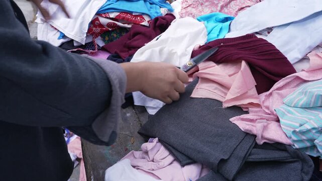 Turning old clothes into rags is a simple DIY project that reduces household waste and replaces paper towels