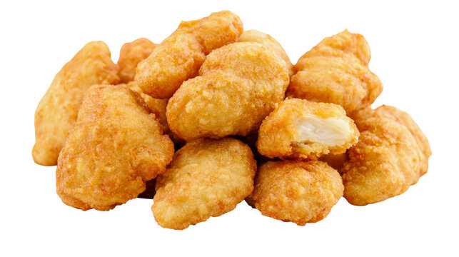 Golden crispy breaded chicken nuggets pile
