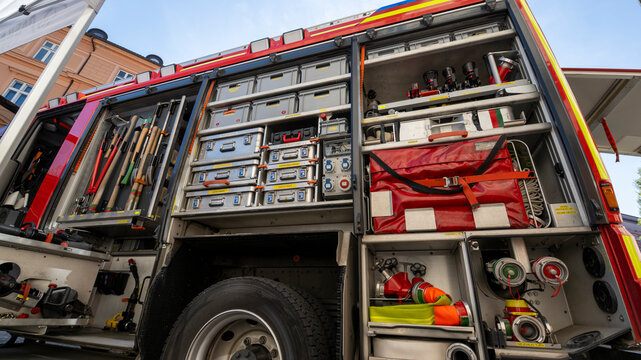 Detailed firefighting equipment and rescue tools inside a modern fire engine