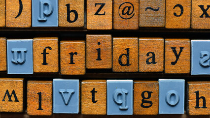 Friday Lettering on Vintage Wooden Printing Blocks with Blue Accents © roobcio
