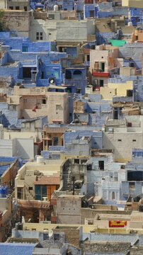 Vertical view of traditional blue homes in Jodhpur city in India