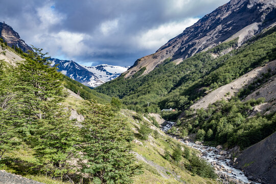 Scenic view of torres del paine national park with snow-capped mountains and blue lake in patagonia