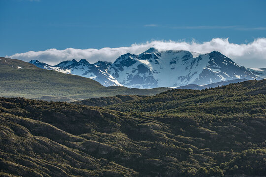 Scenic view of torres del paine national park with snow-capped mountains and blue lake in patagonia