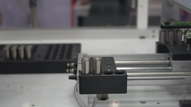 automatic robot arm at industrial manufacture factory of lithium battery