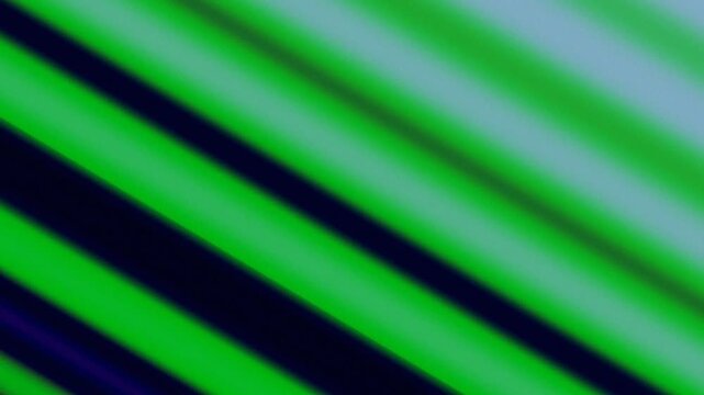 Vibrant green and blue diagonal lines with soft texture background