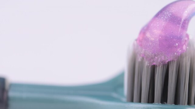  video of a toothbrush with toothpaste