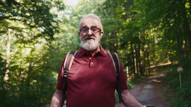 Older man enjoying alone time on hiking trip.