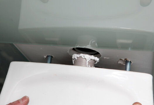 Wall hung toilet installation details in bathroom