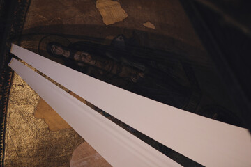 Historic Church Ceiling with Religious Mural and Beams of Light in Architectural Detail © kichigin19