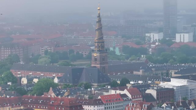 Aerial View of Vor Frelsers Kirke and Copenhagen Cityscape in Morning Mist