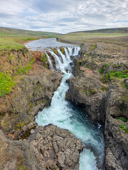 Raudanesfoss Waterfall Flowing Through Canyon in Iceland © vadiml